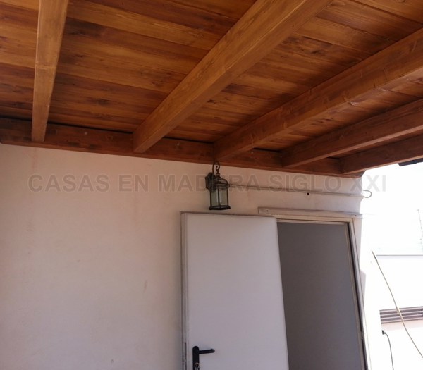 Pérgola adosada a pared