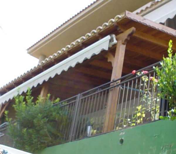 Pérgola adosada a pared