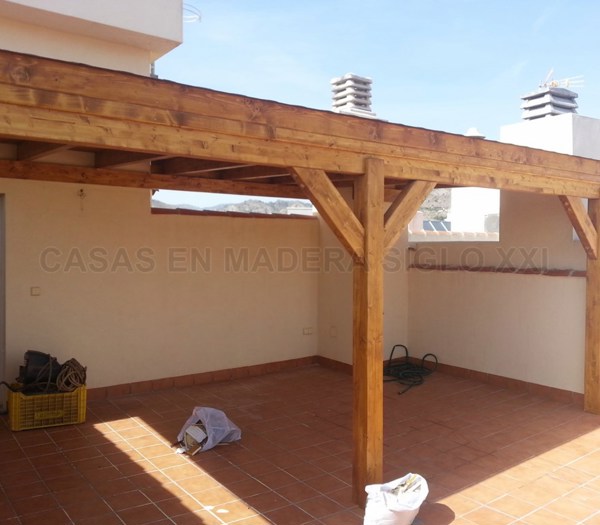 Pérgola adosada a pared