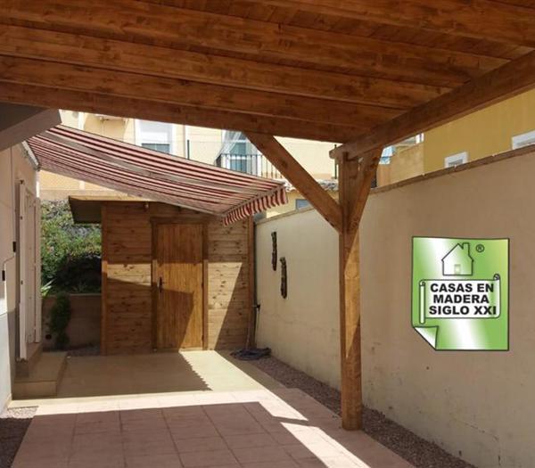 Pérgola adosada a pared